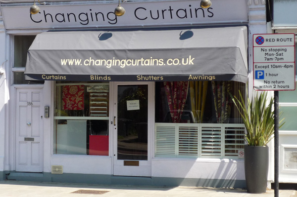 Changing Curtains display of plantation shutters in North London 