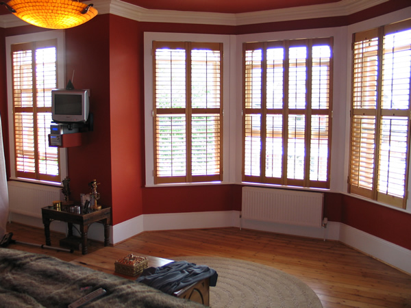 Oiled cedar plantation shutters with 47mm louvres