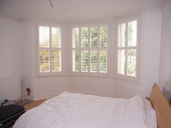 MDF plantation shutters in silk white with 63mm louvres